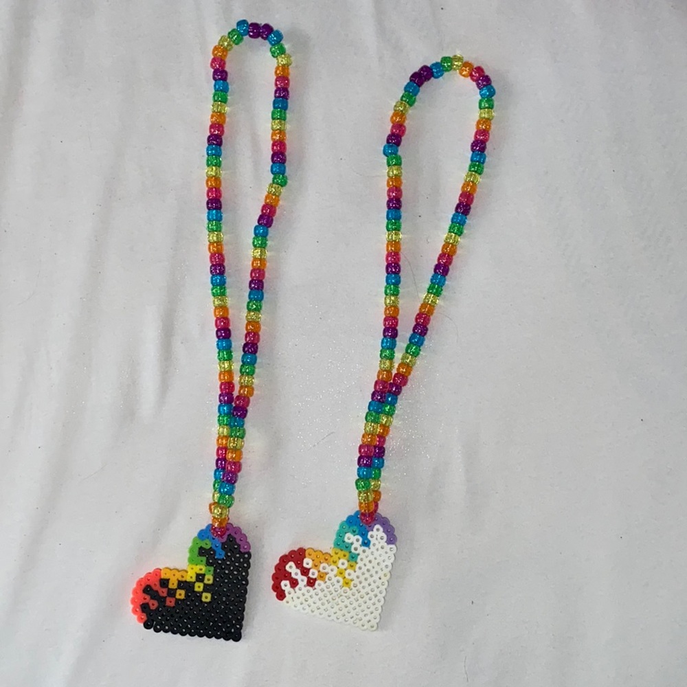 Matching rainbow heart necklaces